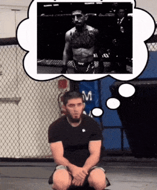 a man sitting in front of a fence with a thought bubble that says ufc