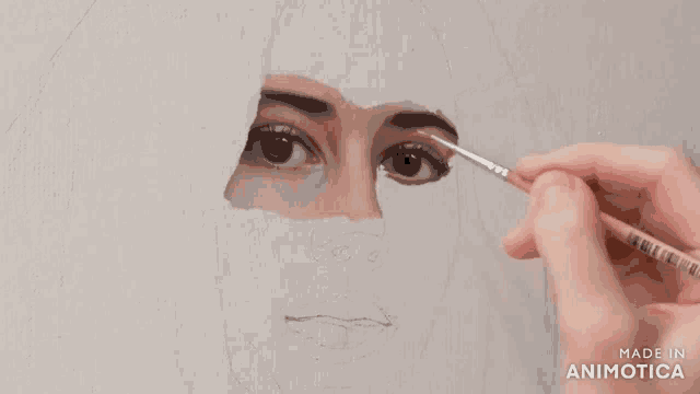 a painting of a woman 's face is being made in animatica