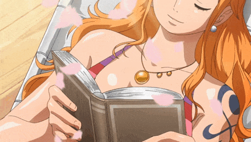 a woman laying on a bed reading a book with petals flying around her