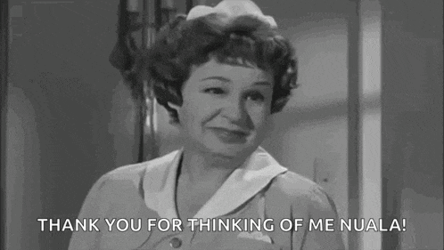a black and white photo of a woman saying `` thank you for thinking of me nuala ! ''