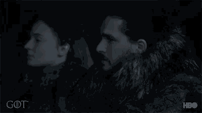 a man and a woman are sitting next to each other and the word got is on the bottom right