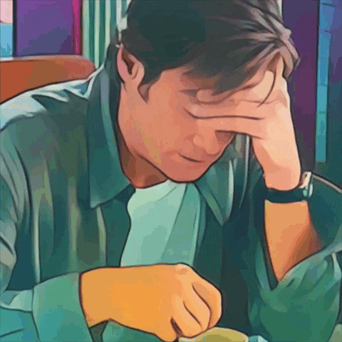 a man with his hand on his forehead looks down at something
