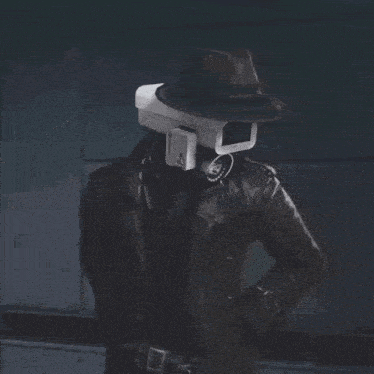 a man holding a gun with a camera attached to his head