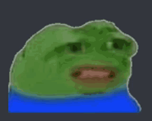 a green frog is wearing a blue shirt and making a funny face .