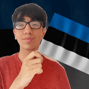 a man wearing glasses is holding a flag in front of a blue and black flag