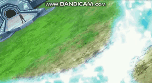 a video of a man standing in front of a waterfall with the words www.bandicam.com at the top