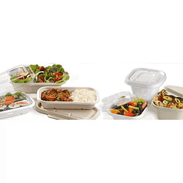 a variety of food containers including a hamburger french fries and a salad