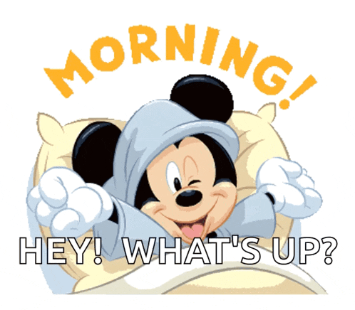 a cartoon of mickey mouse laying in bed with the words morning hey what 's up