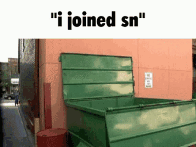 a green dumpster with the words " i joined sn " on the bottom