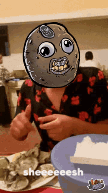 a man with a cartoon face on his head giving a thumbs up and the word sheeeeesh below him
