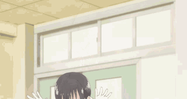 a girl with long black hair is smiling and holding her hair