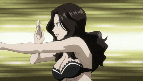 a woman in a black bra is making a karate pose