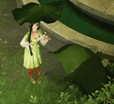 a woman in a green dress is holding a green leaf umbrella