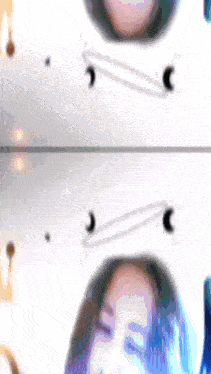 a blurry picture of a person 's face with a white background