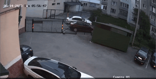 a car is parked in a parking lot with the date 05-14-2023 on the bottom