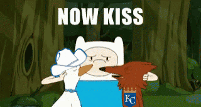 a cartoon of finn kissing a fox with the words now kiss