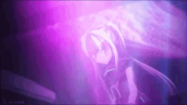 a girl with long hair is standing in a dark room with purple lights .