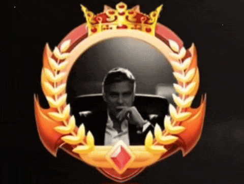 a man in a suit sits in a circle with a crown and laurel wreath around him