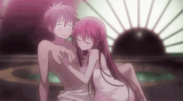 a man and a woman are sitting next to each other in a bathtub . the woman is wrapped in a towel .