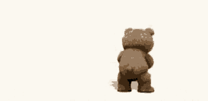 a teddy bear is standing in front of a white background and holding a bottle .