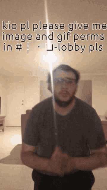 a man holding a sword in front of a sign that says kio pl please give me image and gif perms
