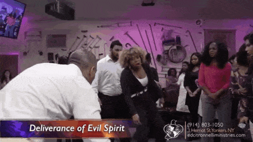 a group of people are gathered in a church with the words deliverance of evil spirit above them