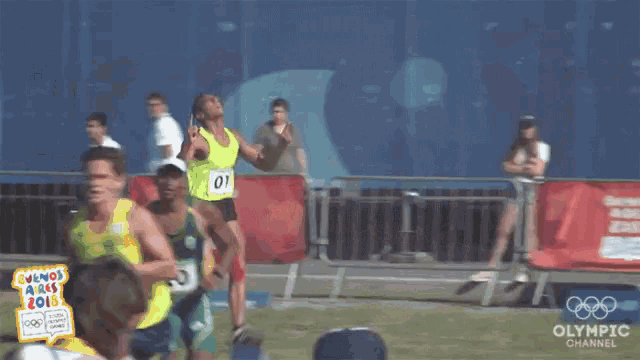 a runner with the number 01 on their shirt