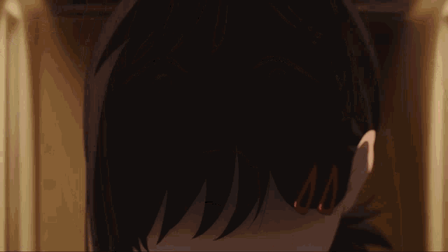 a close up of a person 's hair with a few highlights