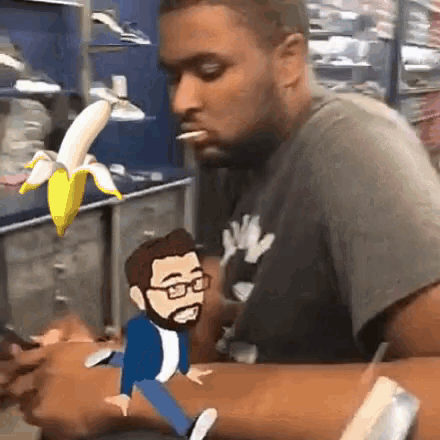 a man smoking a cigarette with a cartoon of a man on his wrist