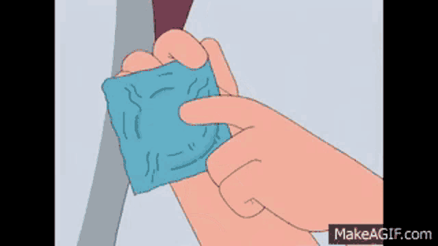 a cartoon hand is holding a piece of blue cloth