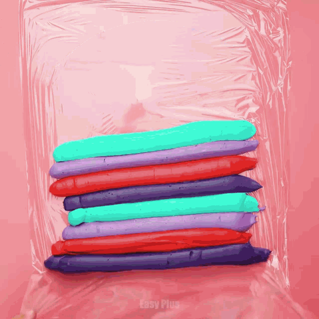 a stack of crayons in a plastic bag that says easy plus on it