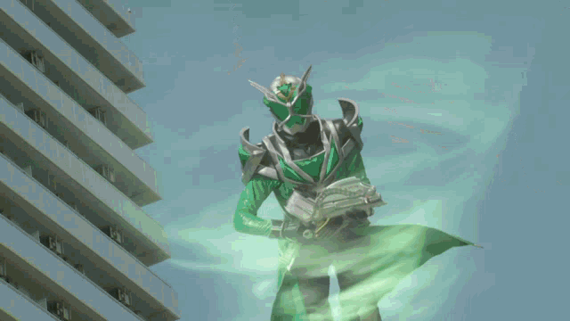 a man in a green suit is flying through the air