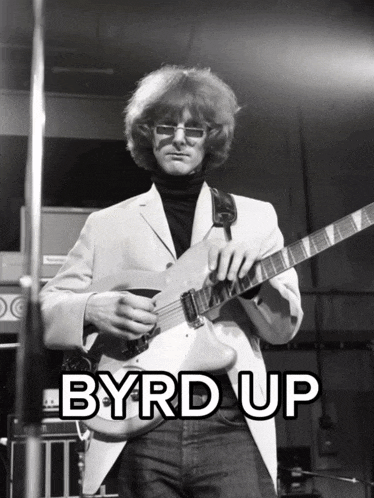 a man playing a guitar with the words byrd up written above him
