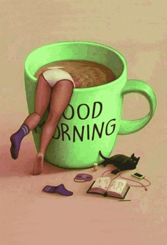 a woman 's legs are sticking out of a cup that says good morning