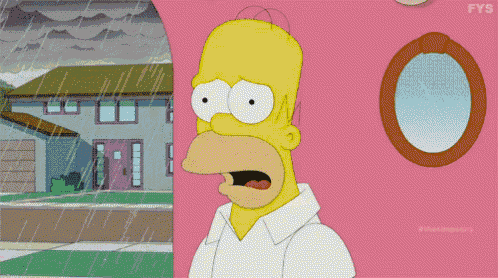 homer simpson is standing in front of a pink house