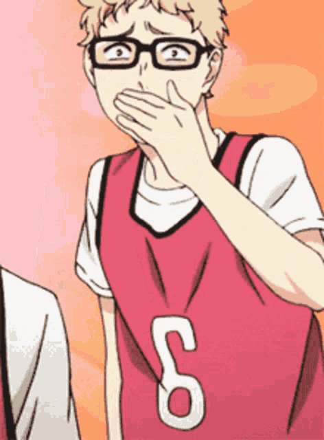 a man wearing glasses and a jersey with the number 6 on it covering his mouth