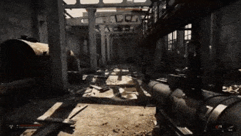 a person is playing a video game in an abandoned building with a gun .