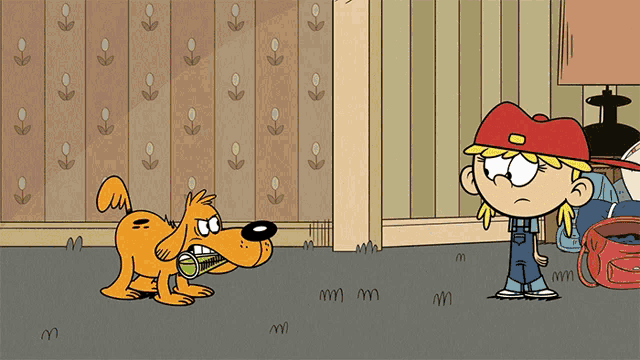 a girl in a red hat is standing next to a dog
