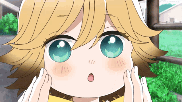 a close up of a child 's face with a surprised look on her face