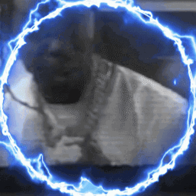 a blue lightning circle around a person 's face