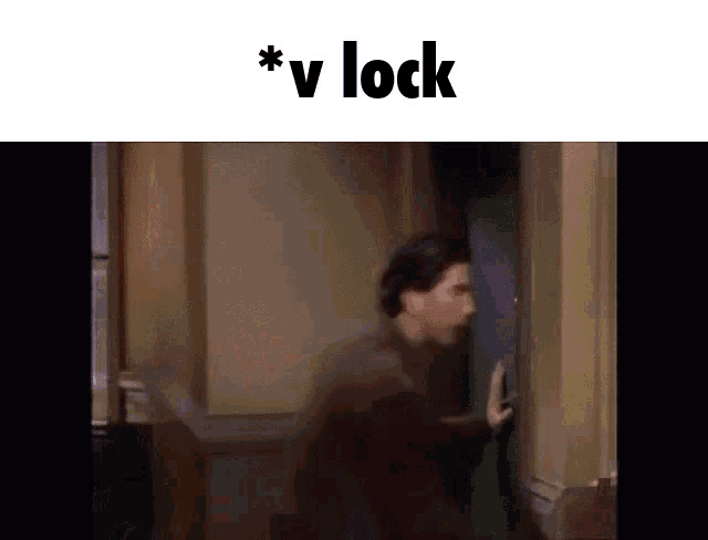 a video of a man opening a door with the words * v lock below him