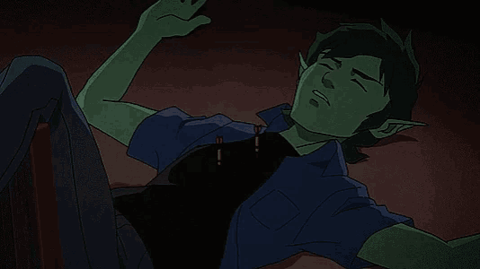 a cartoon character with green hair is laying down