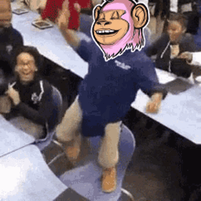 a group of people are sitting at tables with a monkey on their head .