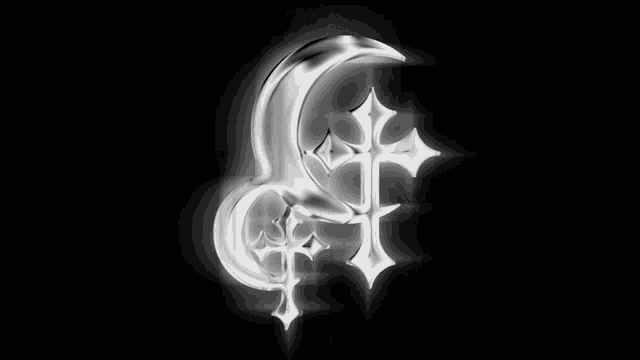 a silver crescent moon with a cross on it