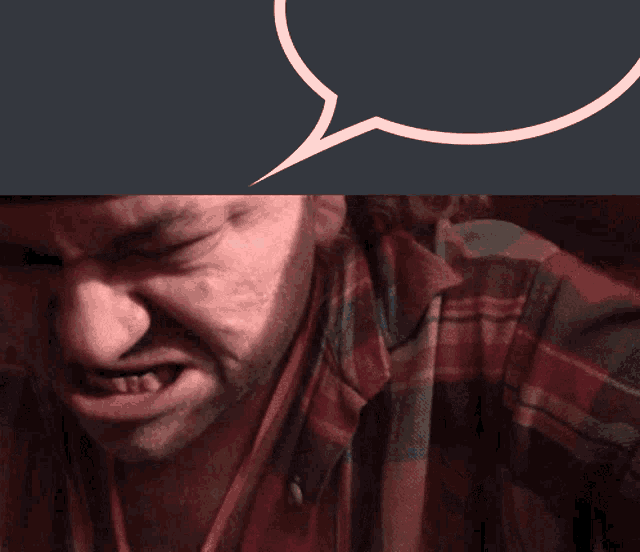 a close up of a man 's face with a speech bubble above his head