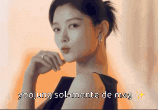 a woman in a black dress with the words yoojung solamente de mag on the bottom