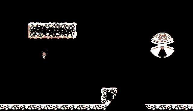 a black and white video game with a red object in the middle of the screen