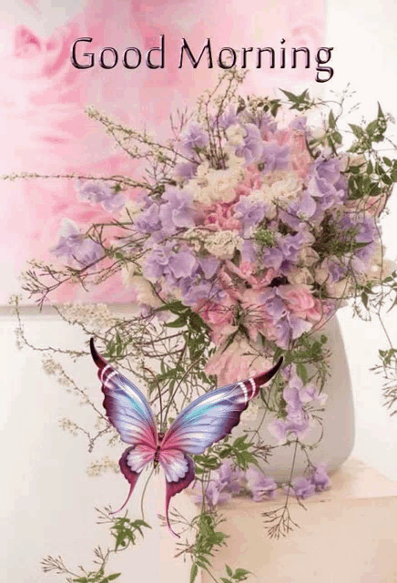 a bouquet of purple and pink flowers with a butterfly on it