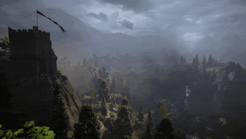 a castle on a hill with a flag flying over it