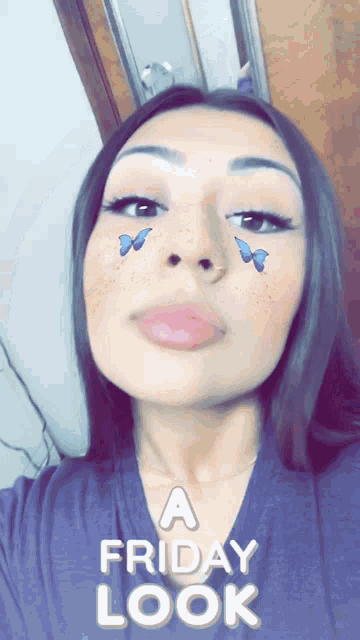 a woman taking a selfie with the words " a friday look " on the bottom